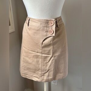 Tan mini skirt with button detail